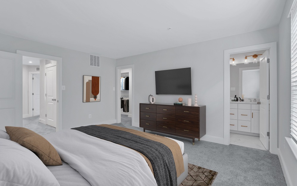 Explore the Hartland at Brookestone in Waldorf, MD: a 2,200 sq. ft. townhome for rent with 3 bedrooms, 2.5 baths, a modern kitchen, and an attached garage.